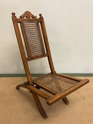 Lot 232 - A collection of doll's furniture including a...