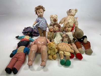 Lot 233 - A collection of dolls and bears including...