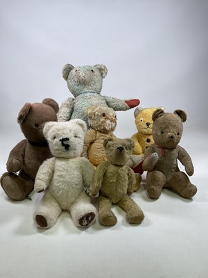 Lot 248 - A hug of seven teddy bears including a large...