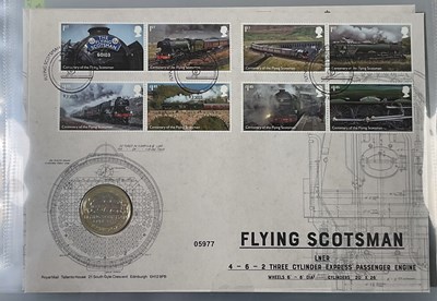 Lot 556 - ROYAL MINT; two albums containing thirty-two...