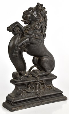 Lot 189 - A cast iron doorstop modelled as a lion...