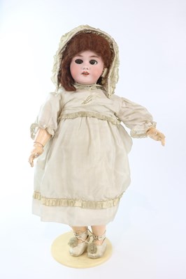 Lot 94 - DEP; an early 20th century bisque headed doll...