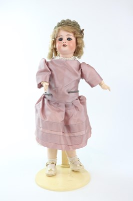 Lot 45 - SFBJ; an early 20th century bisque headed doll...