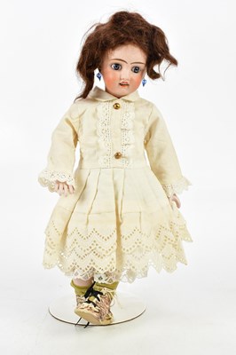 Lot 91 - JULES VERLINGUE; a bisque headed doll with...