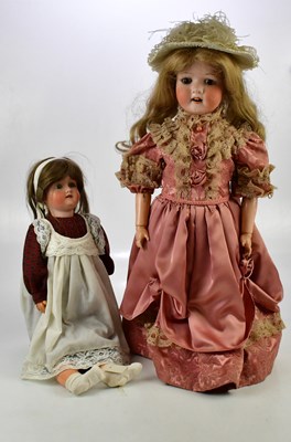 Lot 93 - SIMON & HALBIG; a German bisque headed doll...