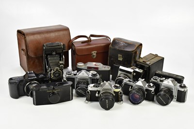 Lot 520 - A collection of cameras, to include a Pentax...