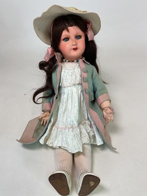 Lot 238 - SFBJ; a French composition doll with wooden...