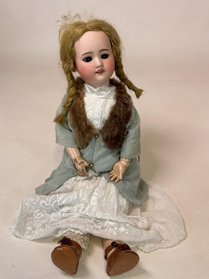 Lot 185 - SFBJ; a bisque head doll with brown sleeping...