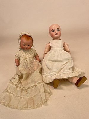 Lot 236 - JDK, KESTNER; a bisque head doll with sleeping...