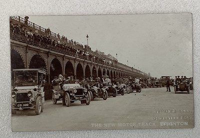 Lot 338 - Three postcard albums containing approximately...