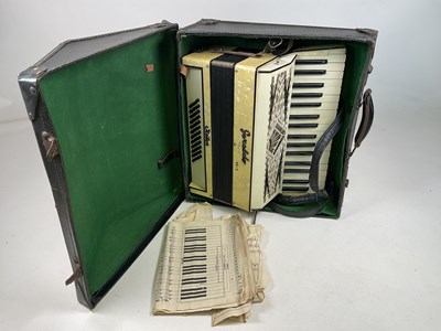 Lot 258 - GERALDO; a standard accordion, with case.