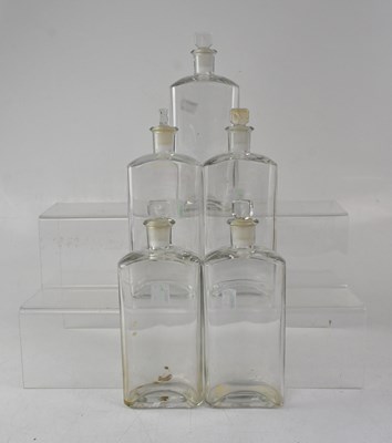 Lot 388 - Five early 20th century apothecary bottles...