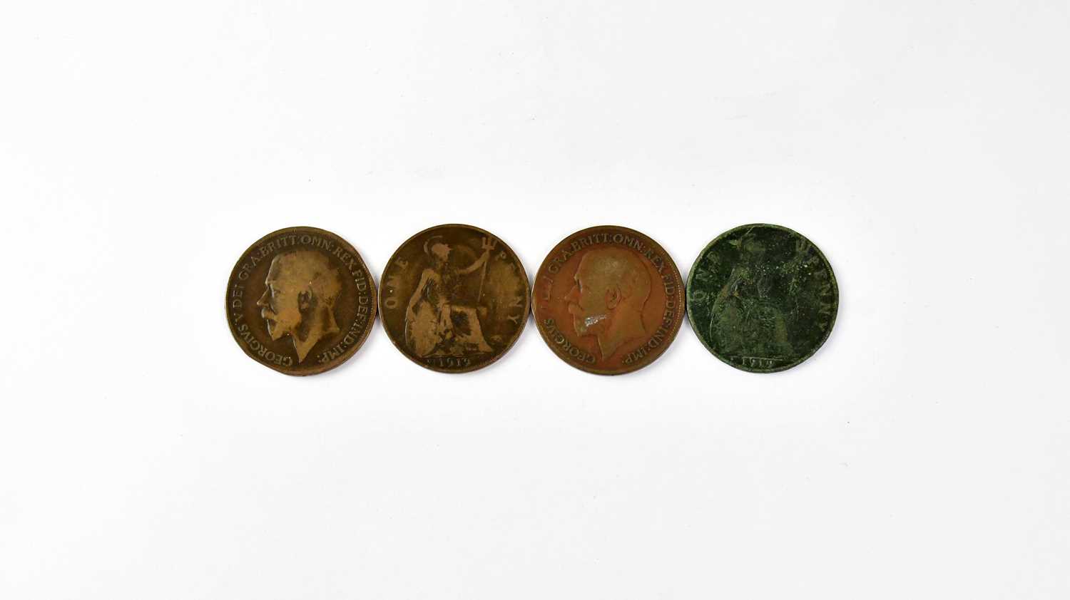 Lot 759 - Four George V 1919 pennies comprising three H...