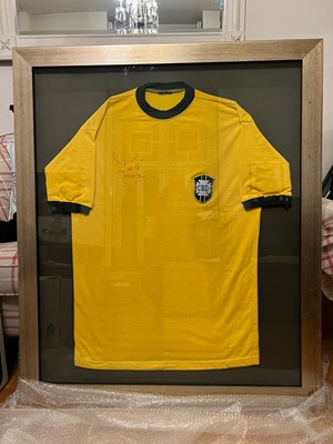 Lot 1 - PELE; a signed Brazil shirt, framed and glazed....