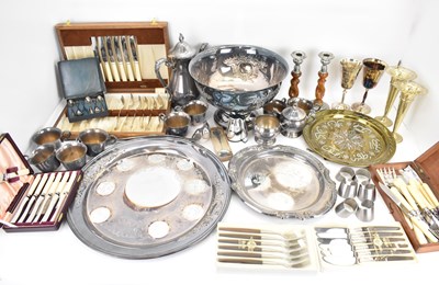 Lot 657 - A quantity of loose and cased silver-plated...