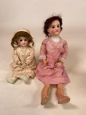 Lot 237 - JULES VERLINGUE; a bisque head (restored) doll...