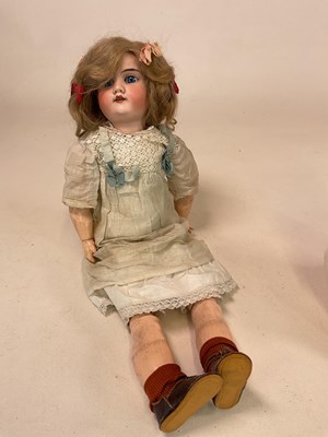 Lot 216 - ARMAND MARSEILLE; a bisque head doll with blue...