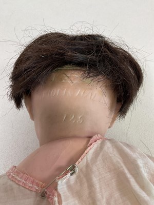 Lot 217 - KAMMER & REINHARDT; a bisque head doll with...