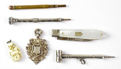 Lot 714 - A collection of hallmarked silver items to...