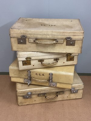 Lot 54 - Four mid 20th century vellum travel cases all...