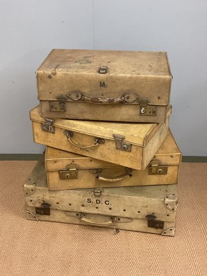 Lot 55 - Four mid 20th century vellum travel cases of...