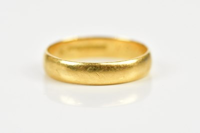 Lot 110 - A 22ct yellow gold wedding band, size Q,...