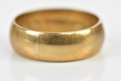 Lot 126 - A large 9ct yellow gold wedding band, size W,...