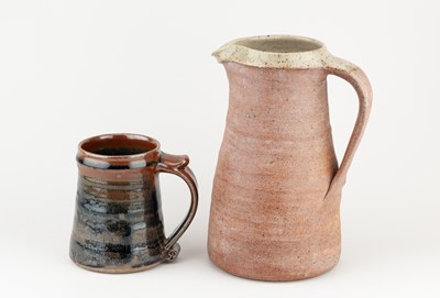 Lot 67 - Leach Pottery; a stoneware jug with oatmeal...