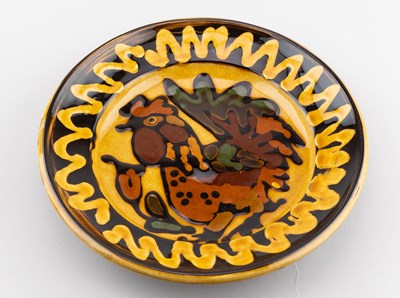 Lot 416 - MARY WONDRAUSCH (1923-2016); a slipware plate...