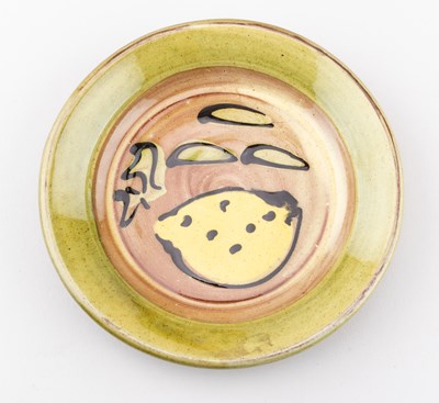 Lot 416 - MARY WONDRAUSCH (1923-2016); a slipware plate...