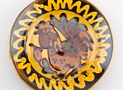 Lot 416 - MARY WONDRAUSCH (1923-2016); a slipware plate...