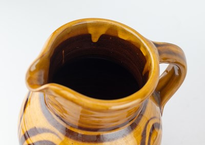 Lot 107 - CLIVE BOWEN (born 1943); a slipware jug,...