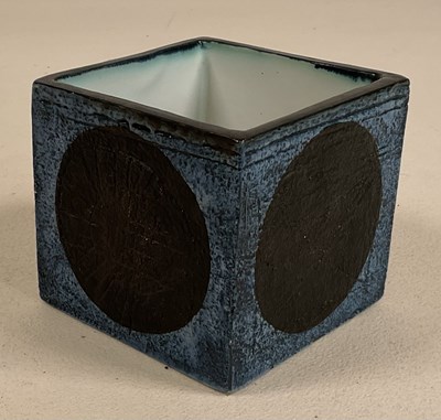 Lot 279 - TROIKA; a cube vase with black circles to each...