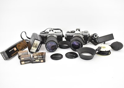 Lot 623 - OLYMPUS; two vintage model OM-2N SLR cameras,...