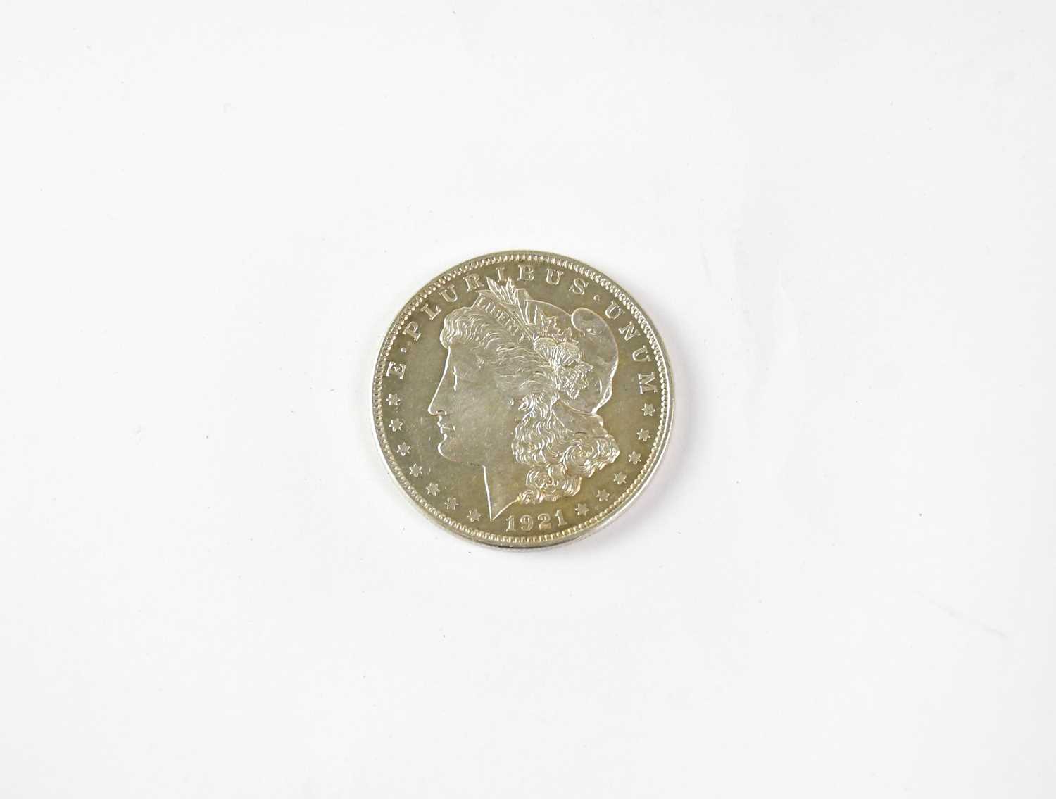 Lot 746 - A 1921 silver Morgan dollar.