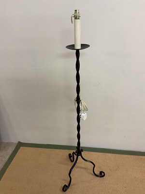 Lot 686 - An Arts and Crafts type iron lamp stand,...