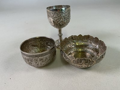 Lot 465 - An Eastern silver bowl with shaped rim,...