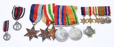 Lot 419 - A WWII five piece medal group and miniatures...