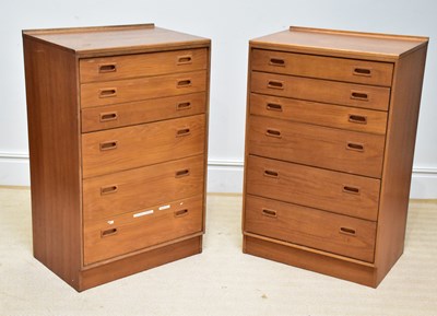 Lot 1010 - A pair of mid century teak chests of six...