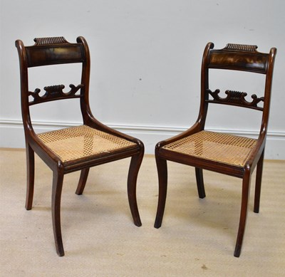 Lot 1239 - A pair of Regency mahogany cane seated chairs,...