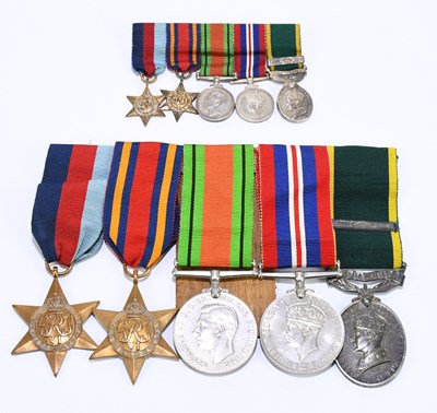 Lot 420 - A WWII group of five medals and miniatures...