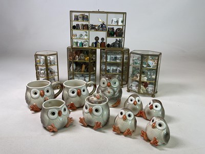 Lot 95 - A collection of thimbles and owl miniatures...