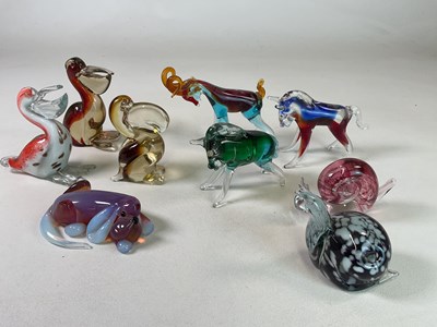 Lot 333 - A collection of glass animals and paperweights...