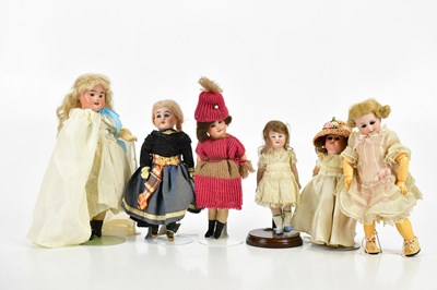 Lot 27 - A collection of bisque headed dolls of small...