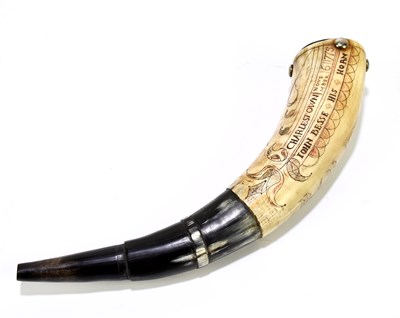 Lot 75 - A reproduction powder horn with carved...