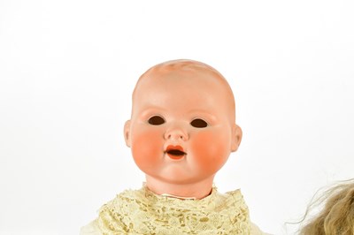 Lot 83 - TETE JUMEAU; a large bisque headed doll with...