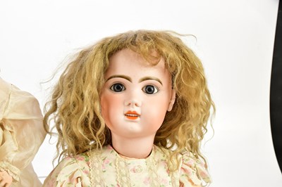 Lot 83 - TETE JUMEAU; a large bisque headed doll with...