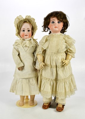 Lot 20 - J STEINER, PARIS; a French bisque headed doll...