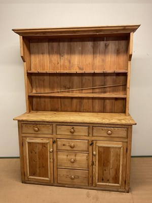 Lot 714 - A pine Welsh dresser, with five drawers and...