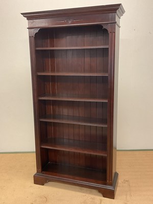 Lot 749 - A reproduction dark wood bookcase with five...